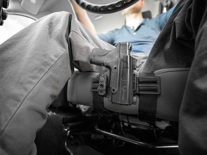 car-seat-holster-in-between-legs.jpg