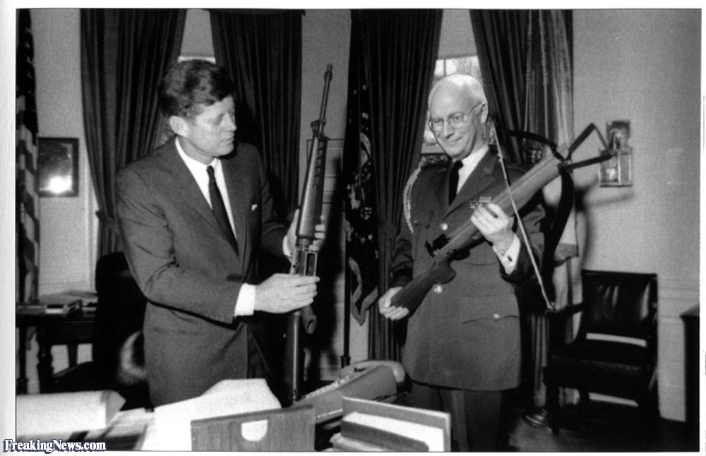 Dick-Cheney-Giving-John-F-Kennedy-a-Gun-19367.jpg