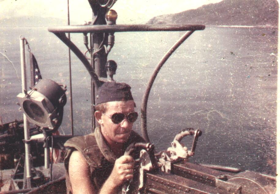 Don Smith manning dual 50 in Gulf of Tonkin 1967.JPG