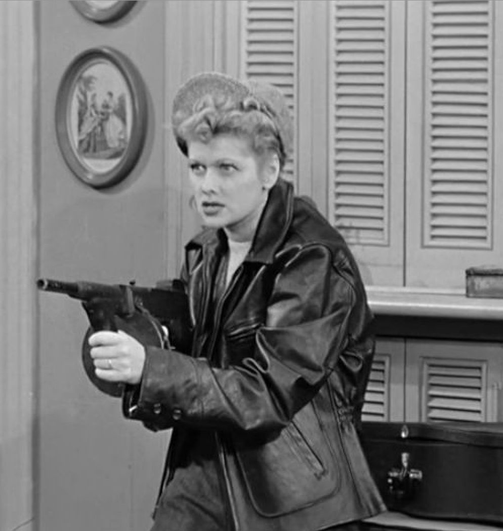 Lucille-gun-girl.webp