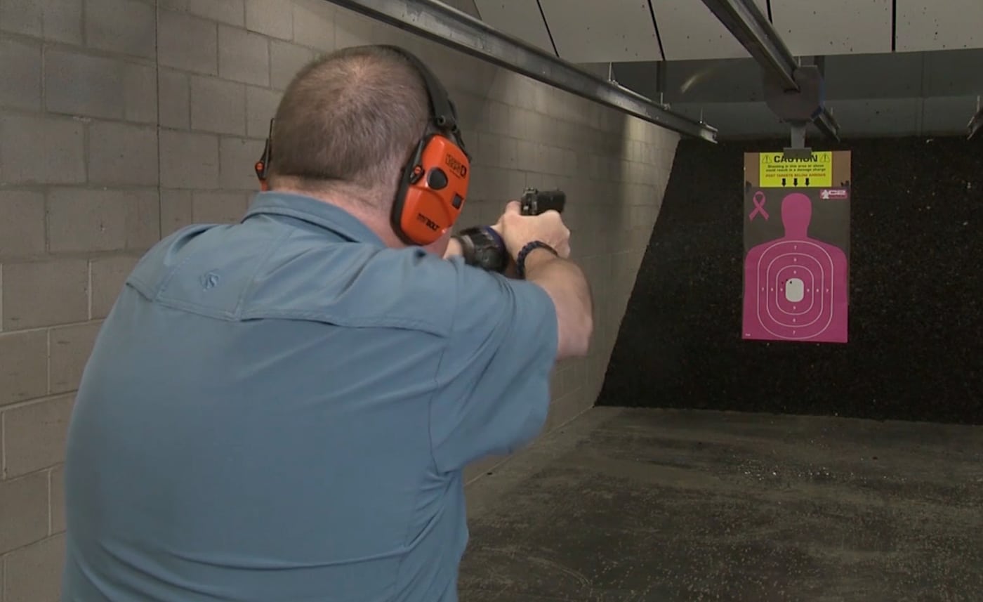 Springfield Armory Custom Shop Professional 1911 being shot on an indoor range