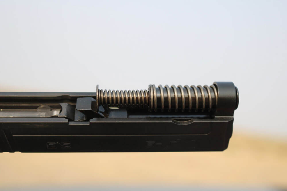The author shows us the captive recoil spring assembly in the Springfield Armory, Inc. semi-auto pistol.