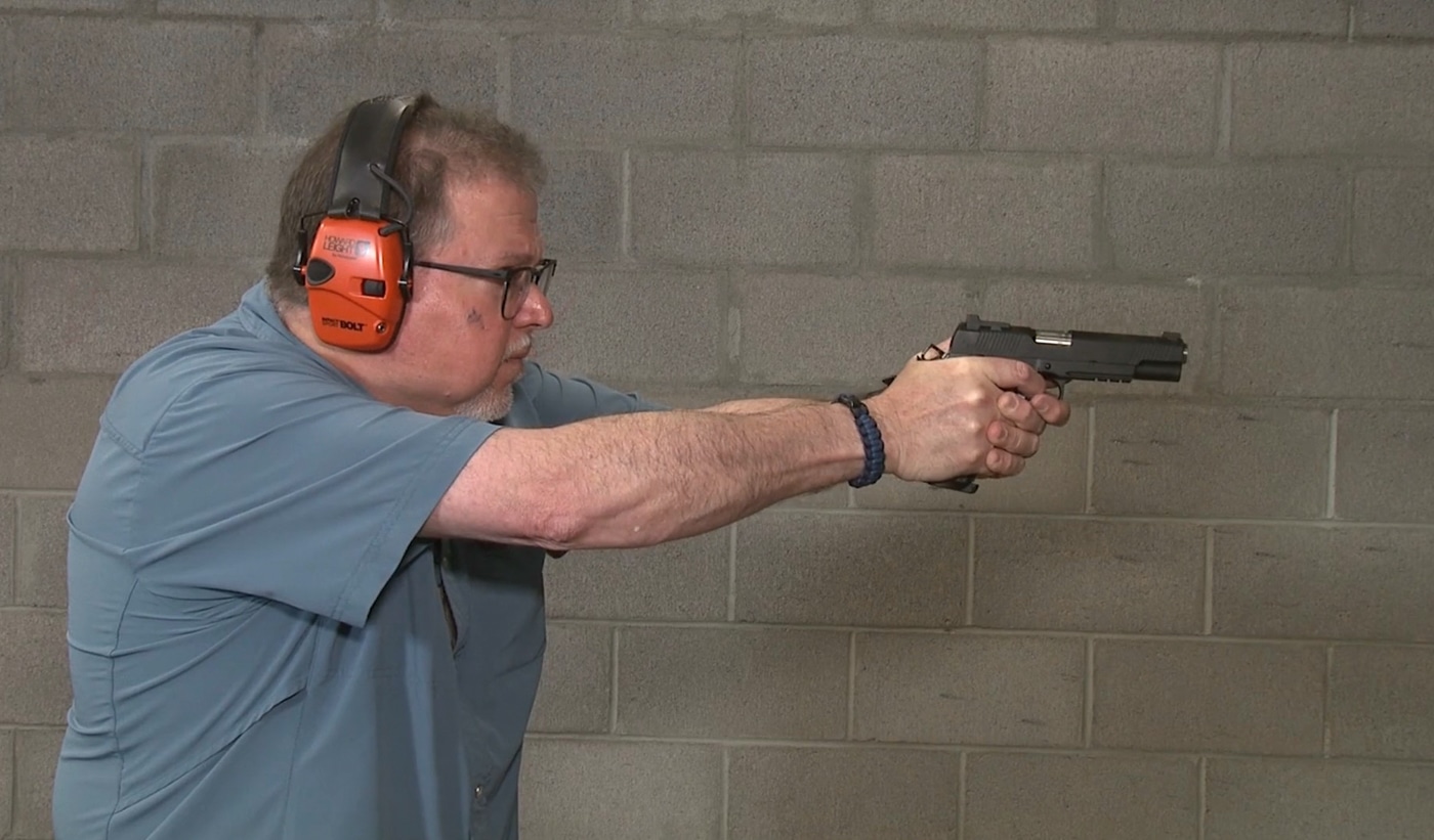 the author tests the new sights on his TRP 1911