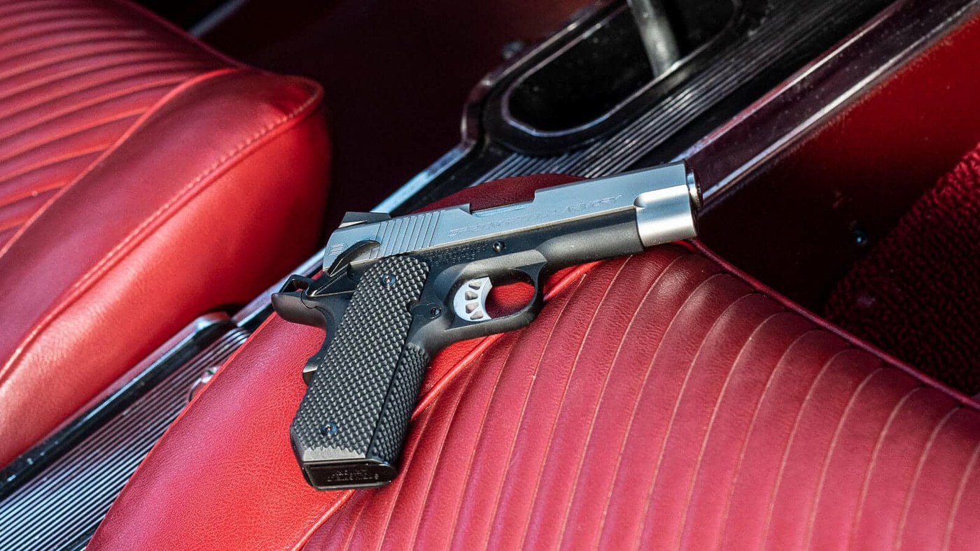 A compact Springfield Armory pistol with a stainless steel finish rests against a neutral background, displaying the classic 1911 profile in reduced dimensions. The EMP4 represents modern compact firearm engineering. Springfield Armory developed the EMP4 specifically for concealed carry. Compact 1911 pistols offer improved concealability over full-size models. The EMP4 chambers 9mm ammunition for reduced recoil. Mini 1911 designs appeal to shooters with smaller hands. Springfield's compact pistol features a bobbed tail grip design. The EMP4 maintains traditional 1911 reliability in a smaller frame.
