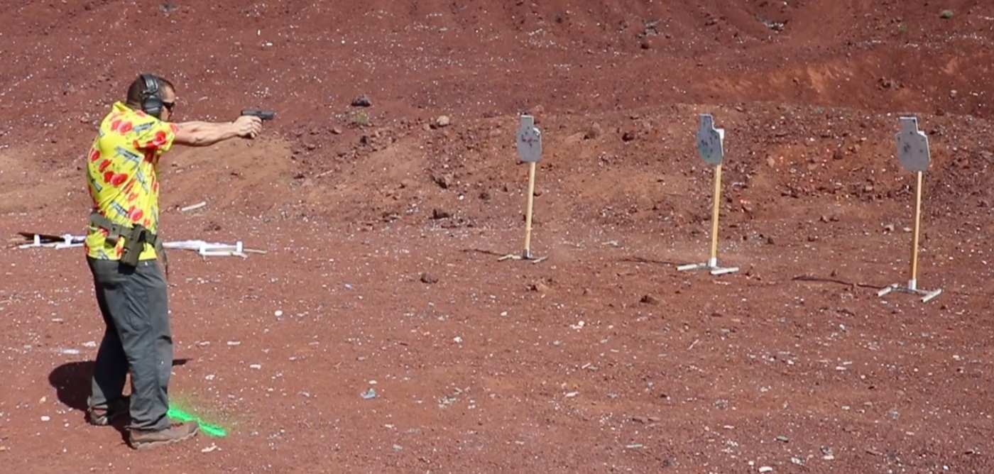 author shooting using the PACT Protimer to improve his speed