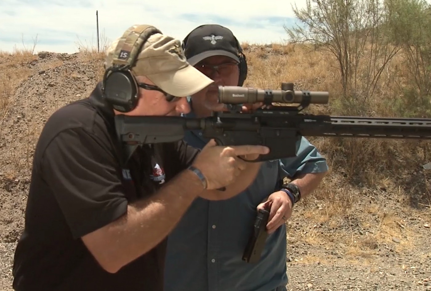 An experienced instructor guides a shooter through the initial positioning sequence for rapid engagement with a defensive rifle. Non-standard response preparation involves multiple checkpoints. Rifle defensive training drills teach combat-ready posture. Defensive shooting instructors demonstrate proper mounting. Tactical rifle setup prevents fundamental failures. Combat rifle training emphasizes pre-engagement discipline. Fighting stance instruction builds consistent habits. Defensive rifle courses address real-world scenarios. Professional instruction accelerates skill development.