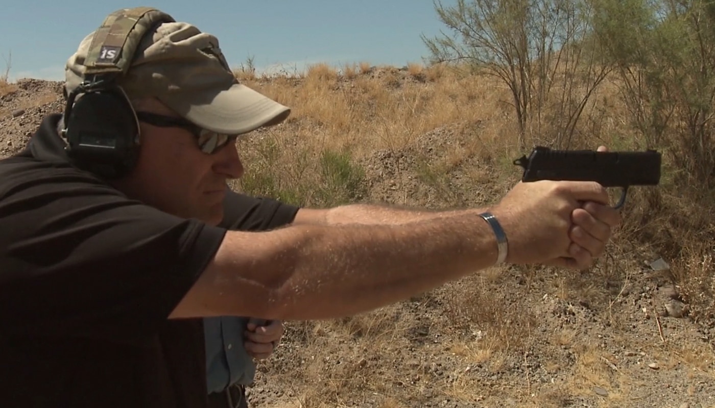 Author firing Springfield pistols at outdoor shooting range while conducting comparative evaluation. XD-S delivers striker-fired simplicity. XD-E provides DA/SA trigger control. Polymer CCW guns require range testing. Compact pistols suit concealed carry. Single-stack handguns reduce printing. Real shooting reveals practical differences. Defensive firearms demand reliable function.