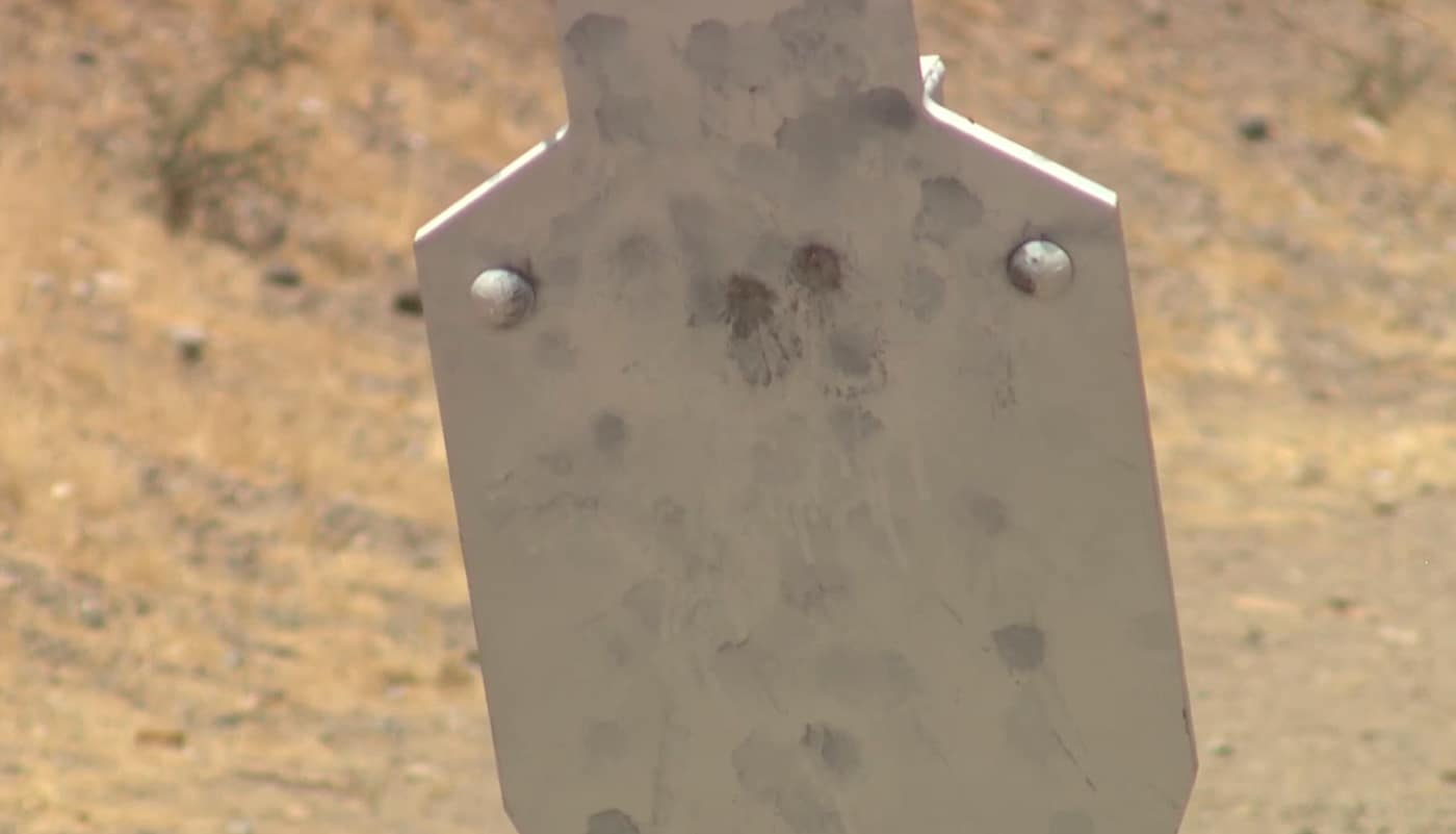 a pair of shots on the steel target