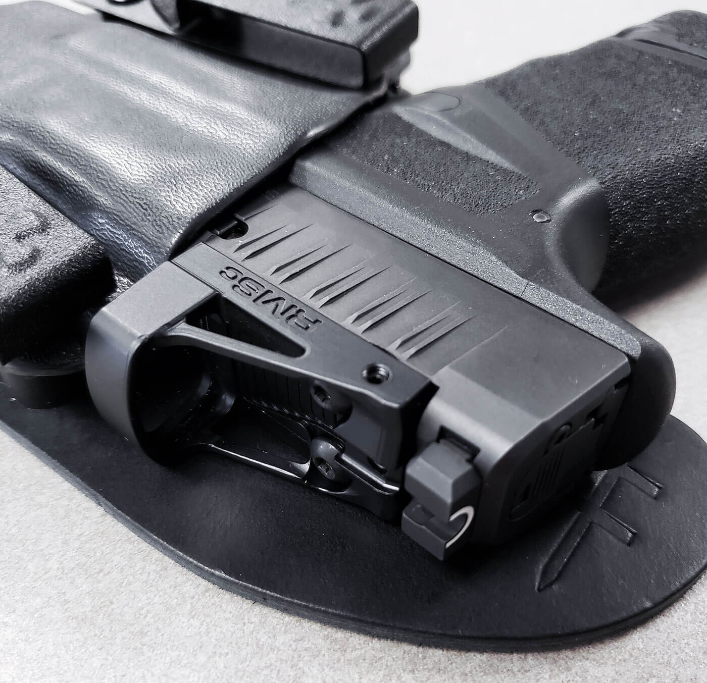 Hellcat pistol in a CrossBreed Reckoning holster