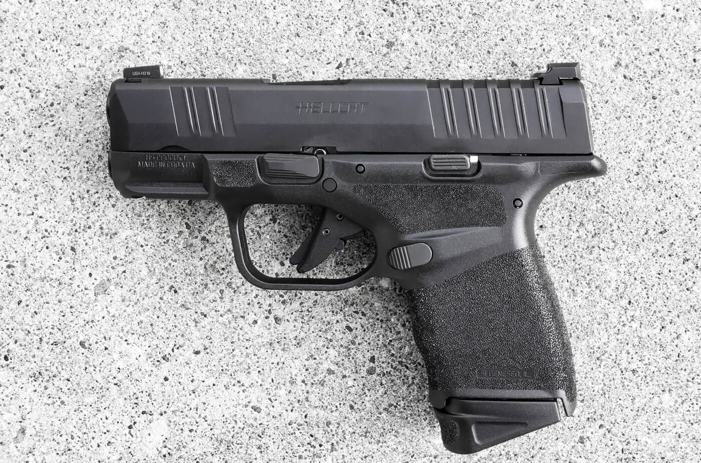 In this image, we get a side view of the Hellcat's <span class='nowrap'>U-Dot</span> sight set as it comes from the company. Students for concealed carry around the country understand what a great gun this is and how these night sights for Springfield Armory are a real game changer. 