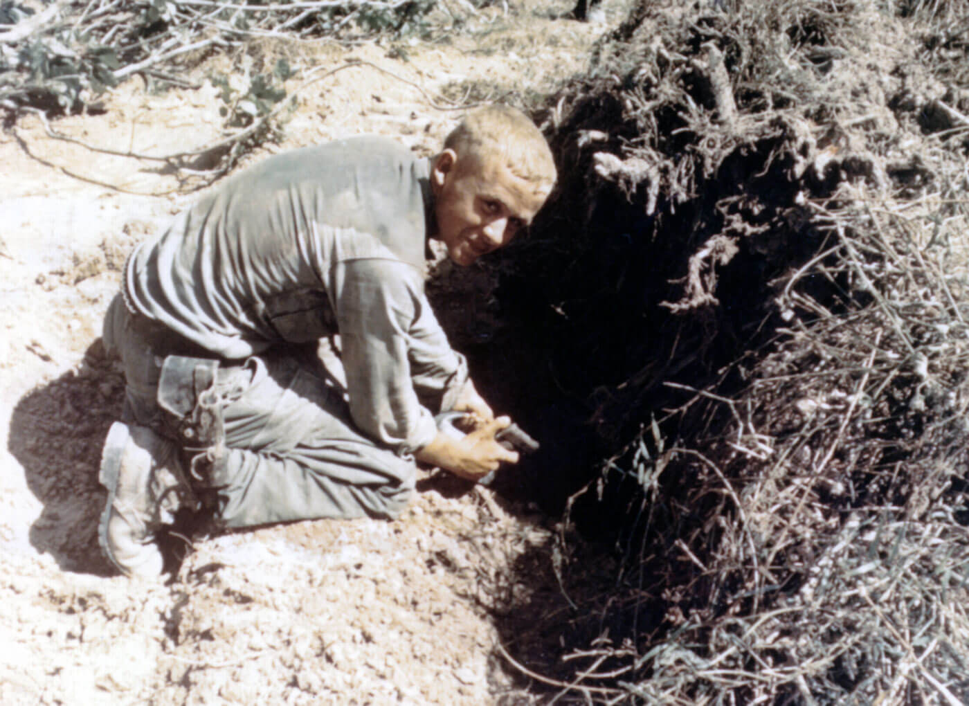 The tunnel rats were American, Australian, New Zealander, and South Vietnamese soldiers who performed underground search and destroy missions during the Vietnam War. A tunnel is an underground or undersea passageway. It is dug through surrounding soil, earth or rock, or laid under water, and is enclosed except for the portals, commonly at each end. Search and destroy is a military strategy which consists of inserting infantry forces into hostile territory and directing them to search and then attack enemy targets before immediately withdrawing.