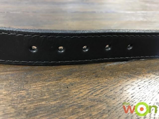 In this photograph, we see a heavy duty black leather belt suitable for concealed carry. If the weather is cold, you'll want to have a jacket. Long pants - jeans, slacks or leggings - along with a hat can help keep you comfortable on the shooting range.