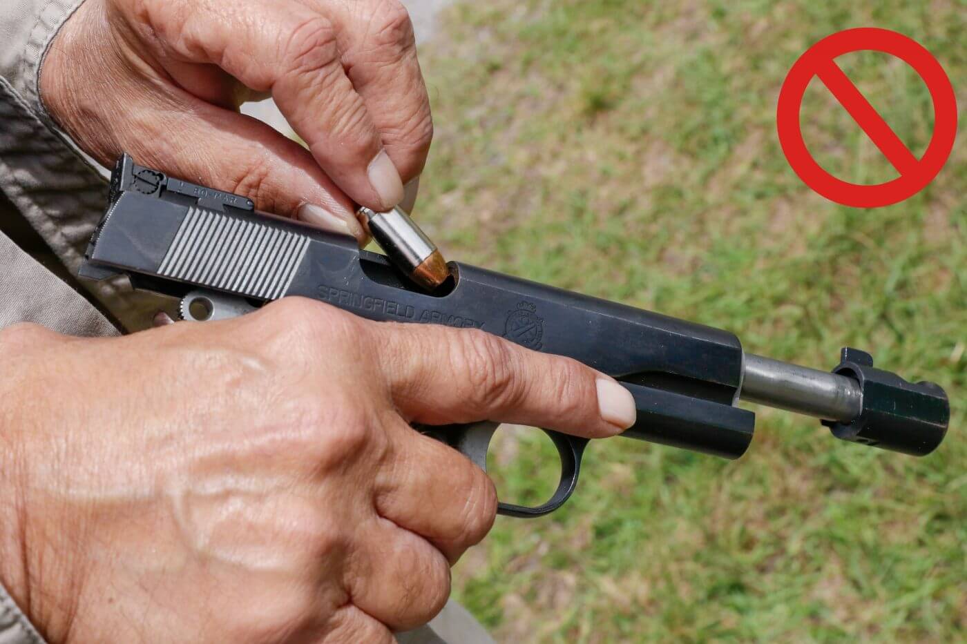 In this photograph, the author demonstrates the improper method of loading a .45 pistol. The .45 ACP, also known as .45 Auto, .45 Automatic, or 11.43×23mm is a rimless straight-walled handgun cartridge designed by John Moses Browning in 1904, for use in his prototype Colt semi-automatic pistol.