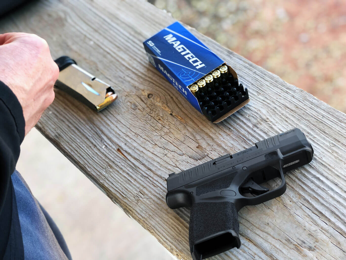 Loading the magazine of the micro compact 9mm Hellcat