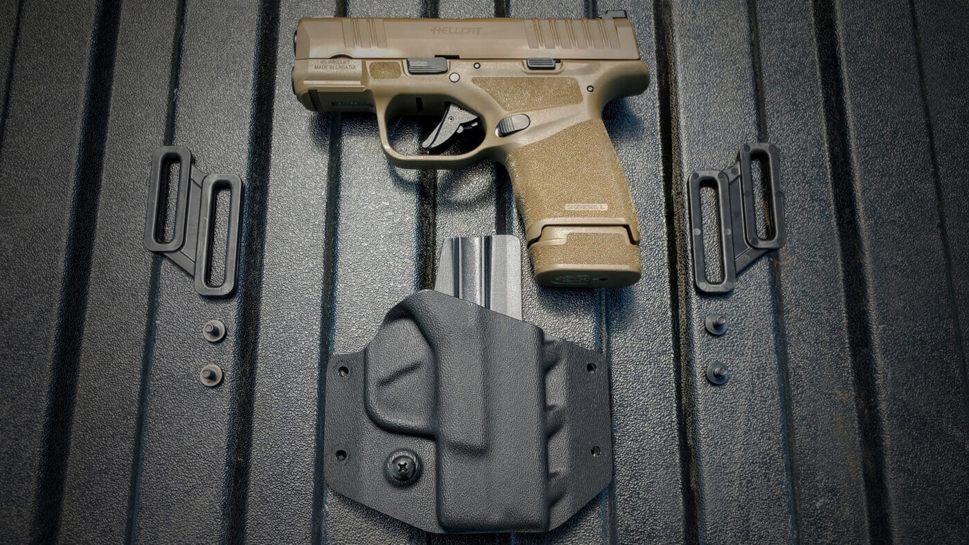 Crucial Concealment Covert OWB Holster with Springfield Hellcat pistol