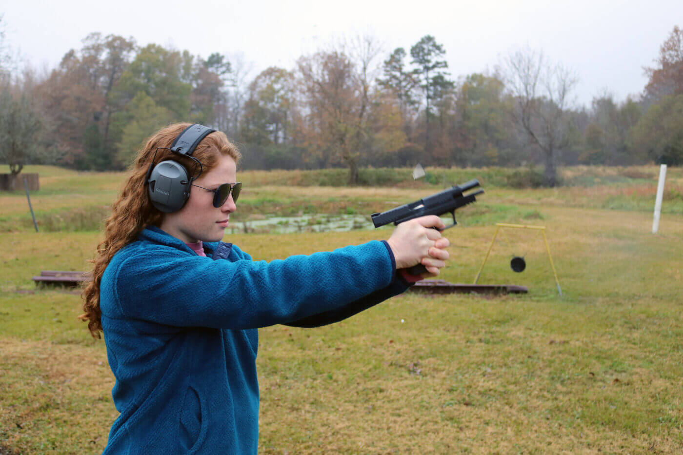 woman shooting a semi-auto pistol