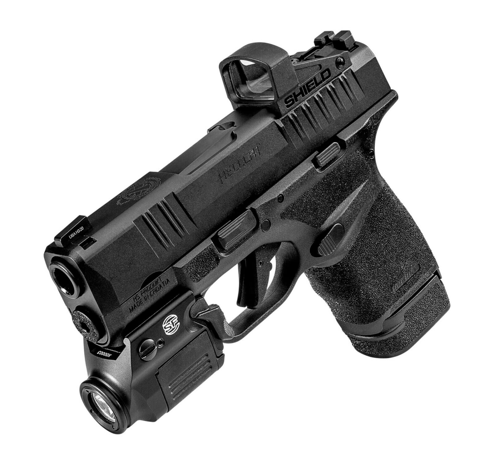 Springfield Hellcat fitted with a Shield red dot and a SureFire XSC flashlight