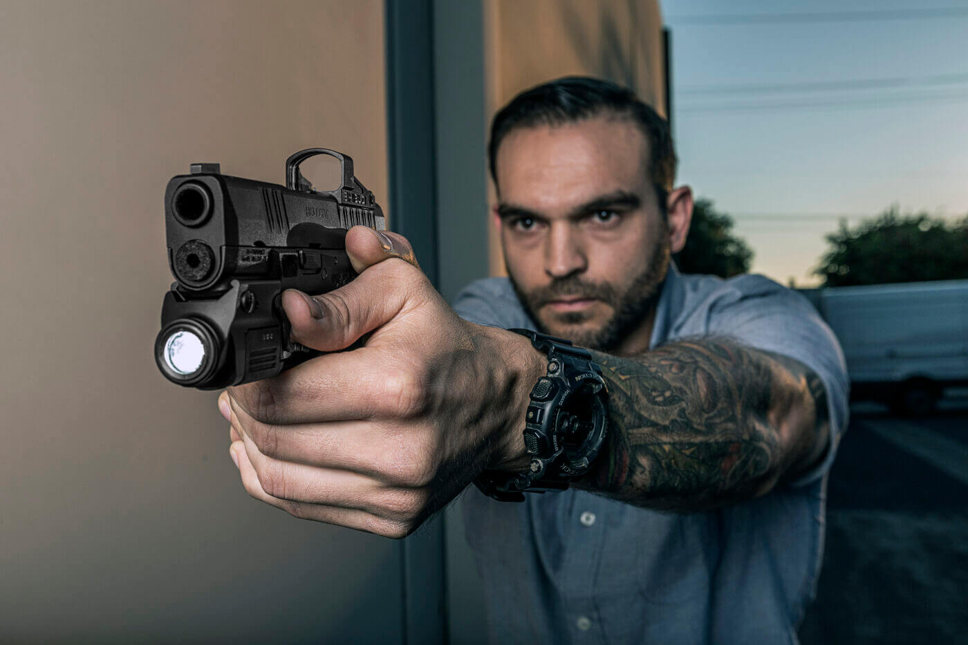 Here we see the testing the XSC flashlight in twilight conditions. SureFire makes a lot of different lights for law enforcement, military and personal defense use.