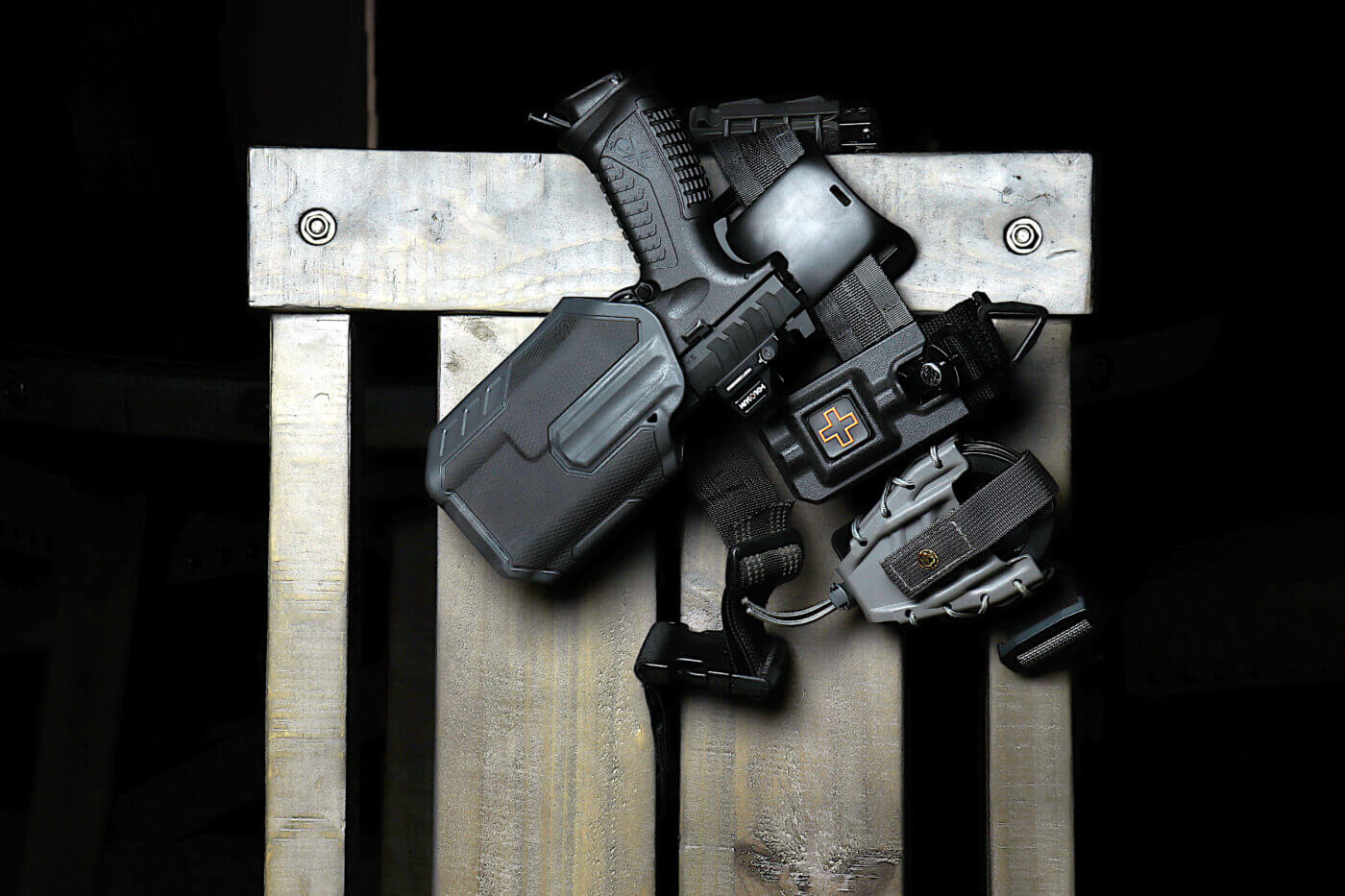 Blackhawk Omnivore holster on duty belt This is a color photograph of the Blackhawk Omnivore holster on the author's duty belt. It is not a thumb break holster, but it still uses a thumb-driven active retention system that locks the gun into the handgun holster. It can be purchased in black or Coyote tan color.