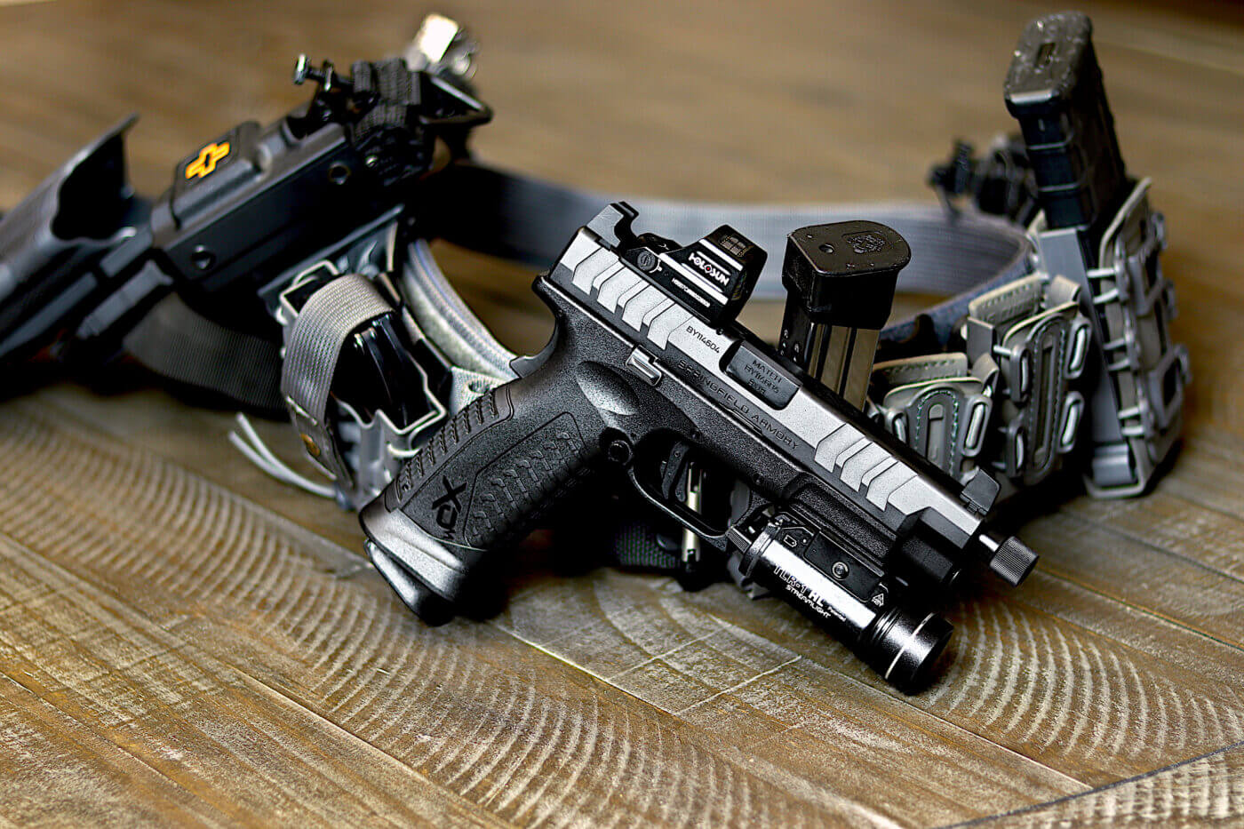 review of the Blackhawk Omnivore holster Shown in this photo are the Blackhawk Omnivore duty holster, the 9x19mm Parabellum chambered Springfield XD-M Elite that is fitted with a Holosun red dot sight and a Streamlight TLR-1 weapon light. The striker-fired pistol is perfect for police officer, deputy sheriff and others in law enforcement. The Blackhawk holster is a perfect match for the handgun.