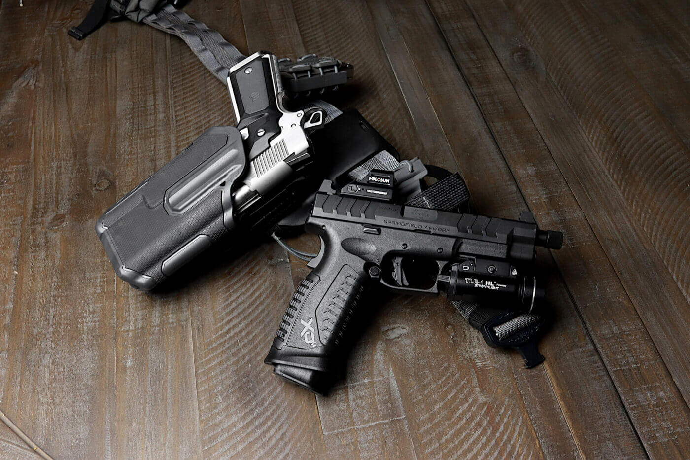 M1911 pistol chambered for .45 ACP pistol cartridge in Blackhawk Omnivore handgun holster The M1911 semi-automatic pistol chambered for the .45 ACP pistol cartridge fits perfectly in the Blackhawk Omnivore. During testing, the author tested different guns in the holster and was impressed at how well the holster performed on the shooting range and in dry fire practice.
