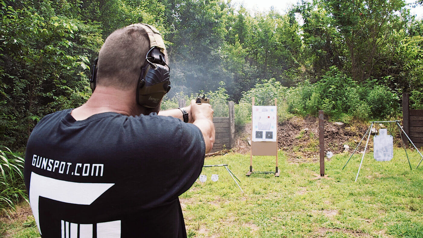 Over the shoulder view of shooting a target