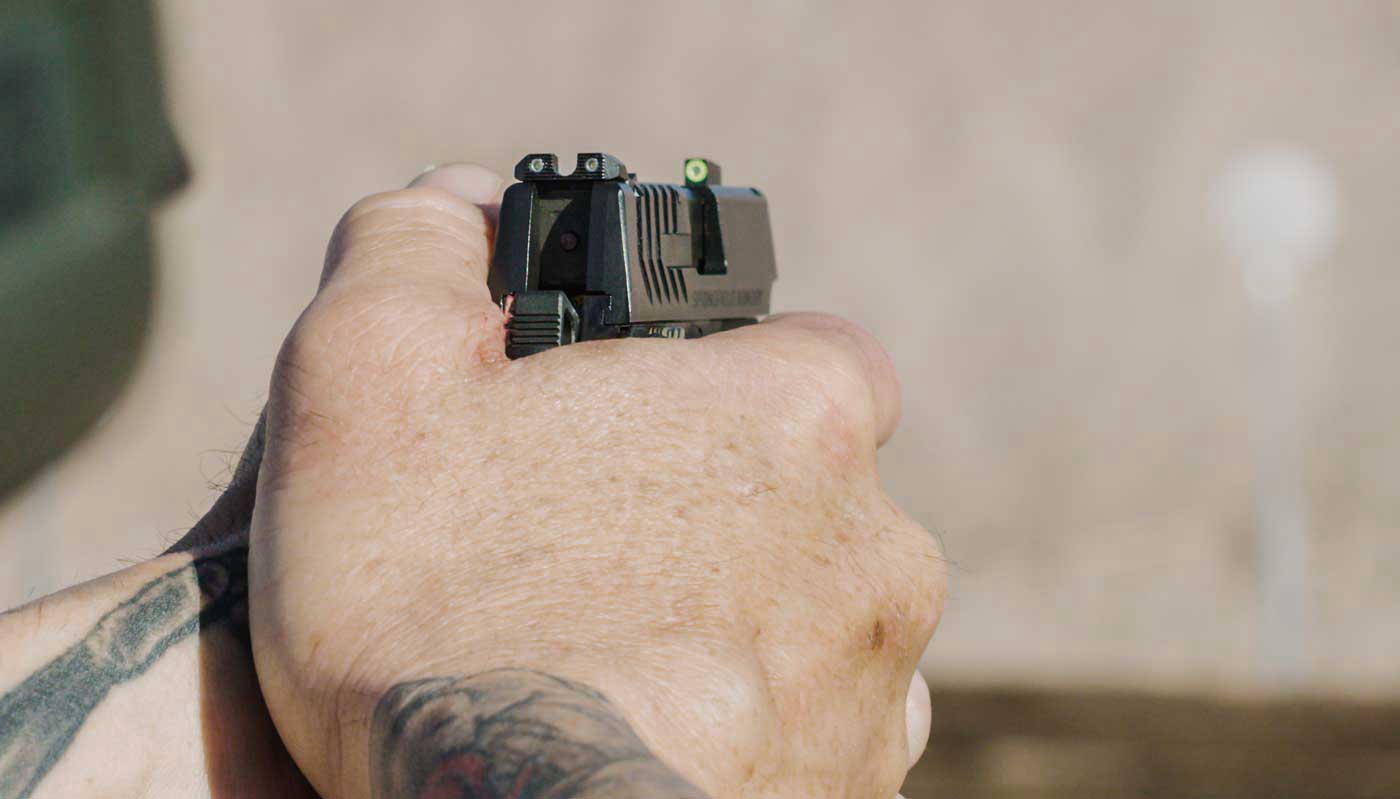 Close up of the Ameriglo Pro-Glo sights on the Springfield 911 pistol.