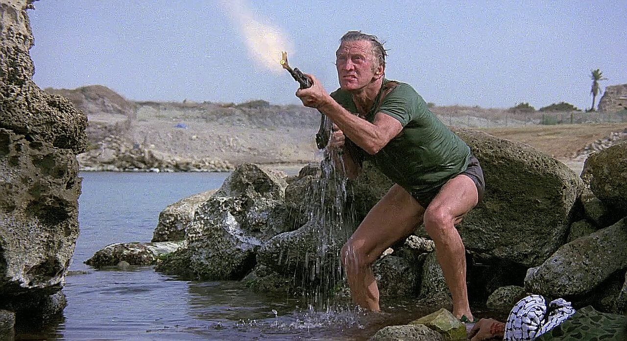 Kirk Douglas with an AK-47 in The Fury