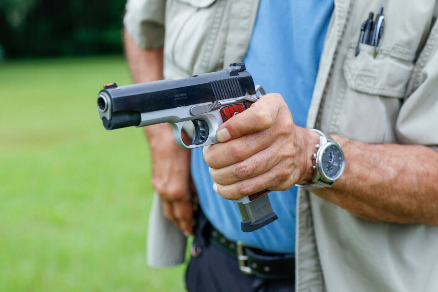 Releasing a magazine on a 1911 pistol