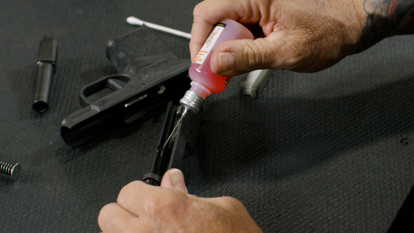 Applying lubricant to Springfield Armory Hellcat