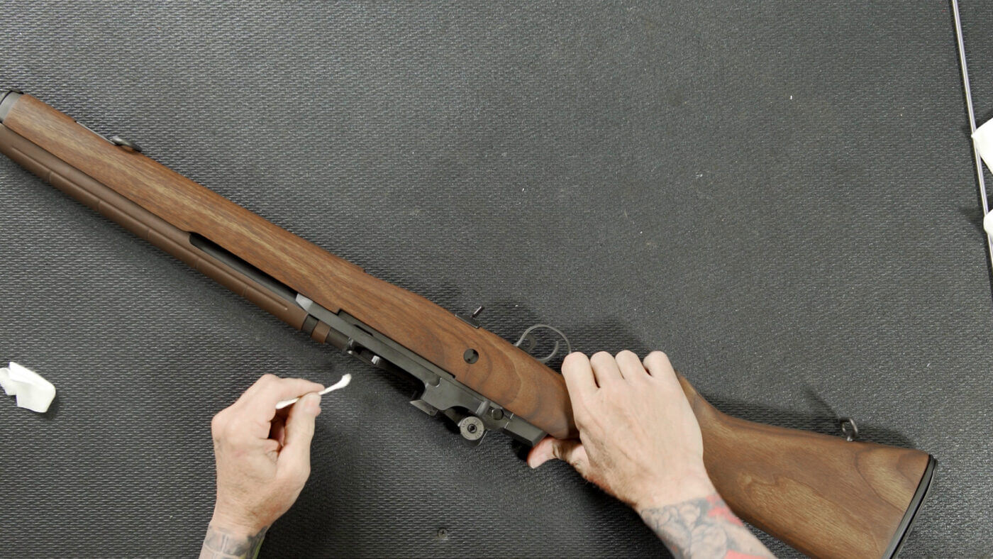 Using a Q-tip to clean the M1A