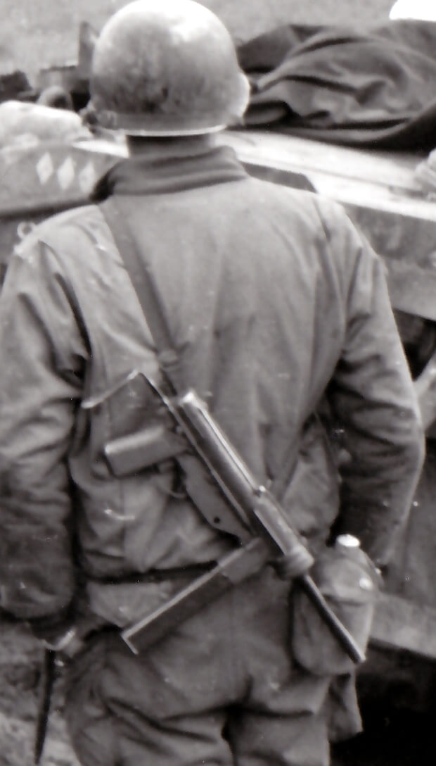 M3 SMG field-modified with a slotted receiver to accept a traditional cocking handle