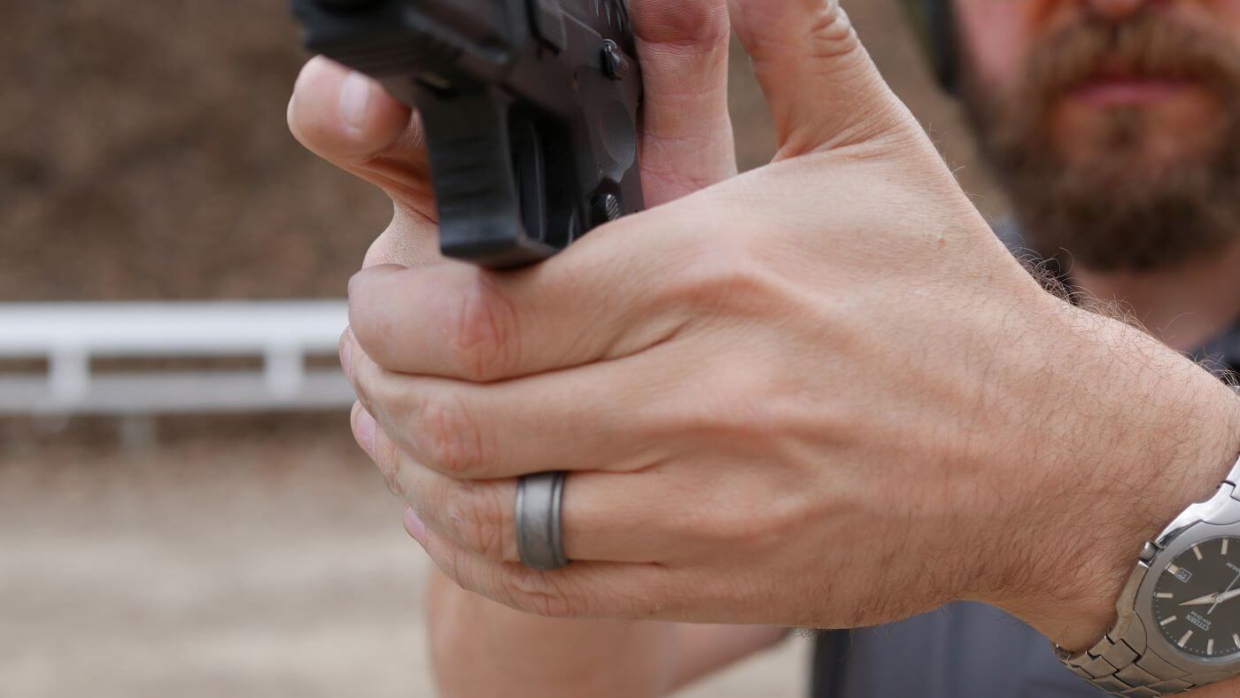 Proper two-handed grip for recoil management