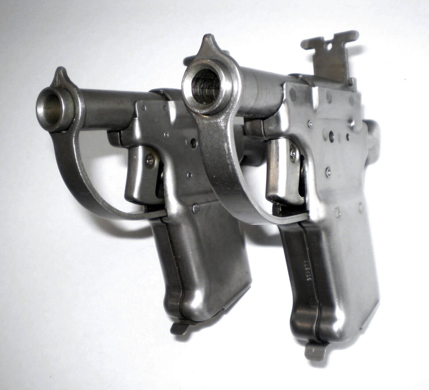 Reproduction Liberator pistol compared to an original