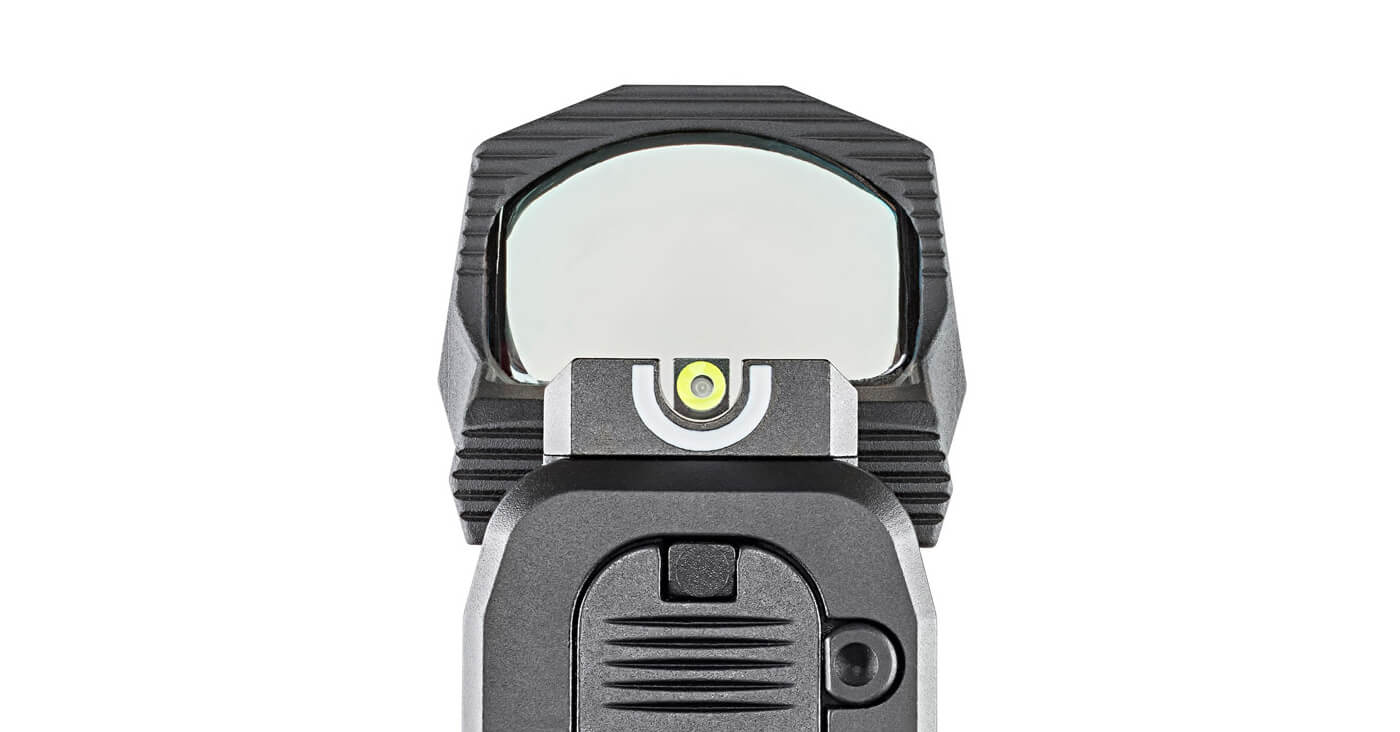 HEX Wasp optic mounted to Hellcat pistol slide while co-witnessing U-Dot sights