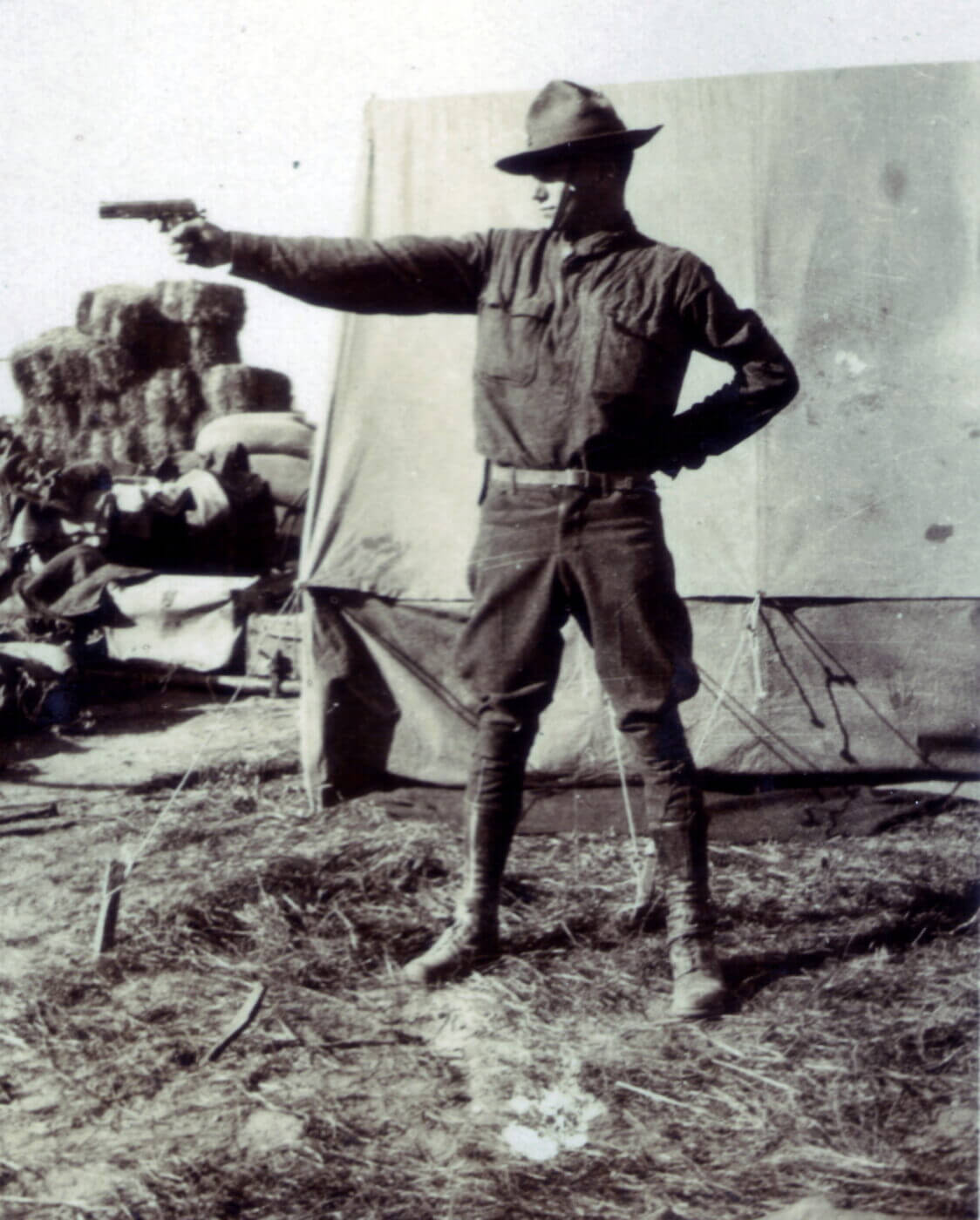 US soldier shooting a M1911 in WWI