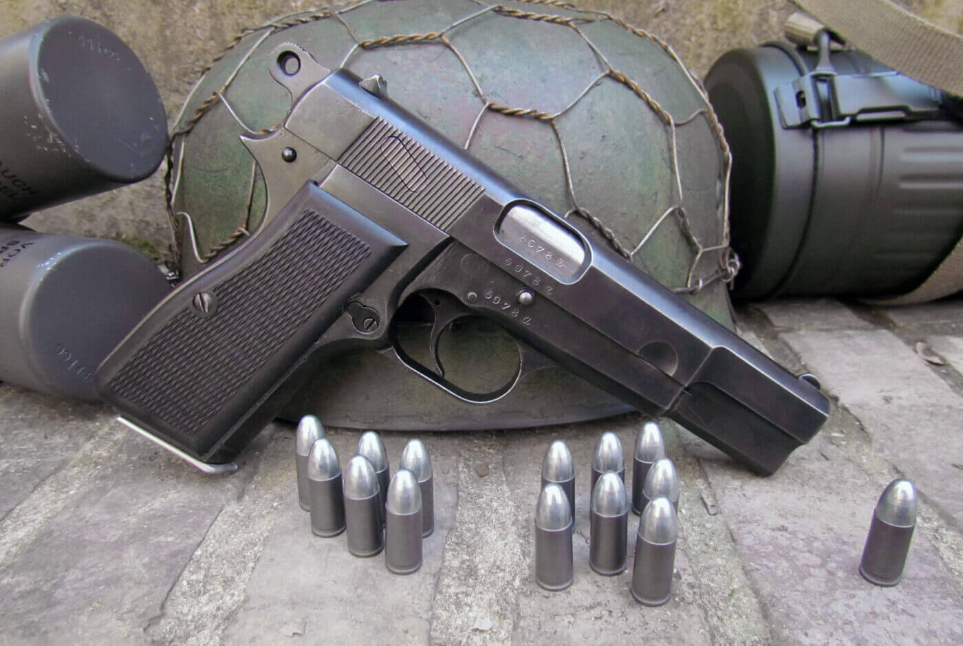 Browning Hi-Power with helmet and ammo