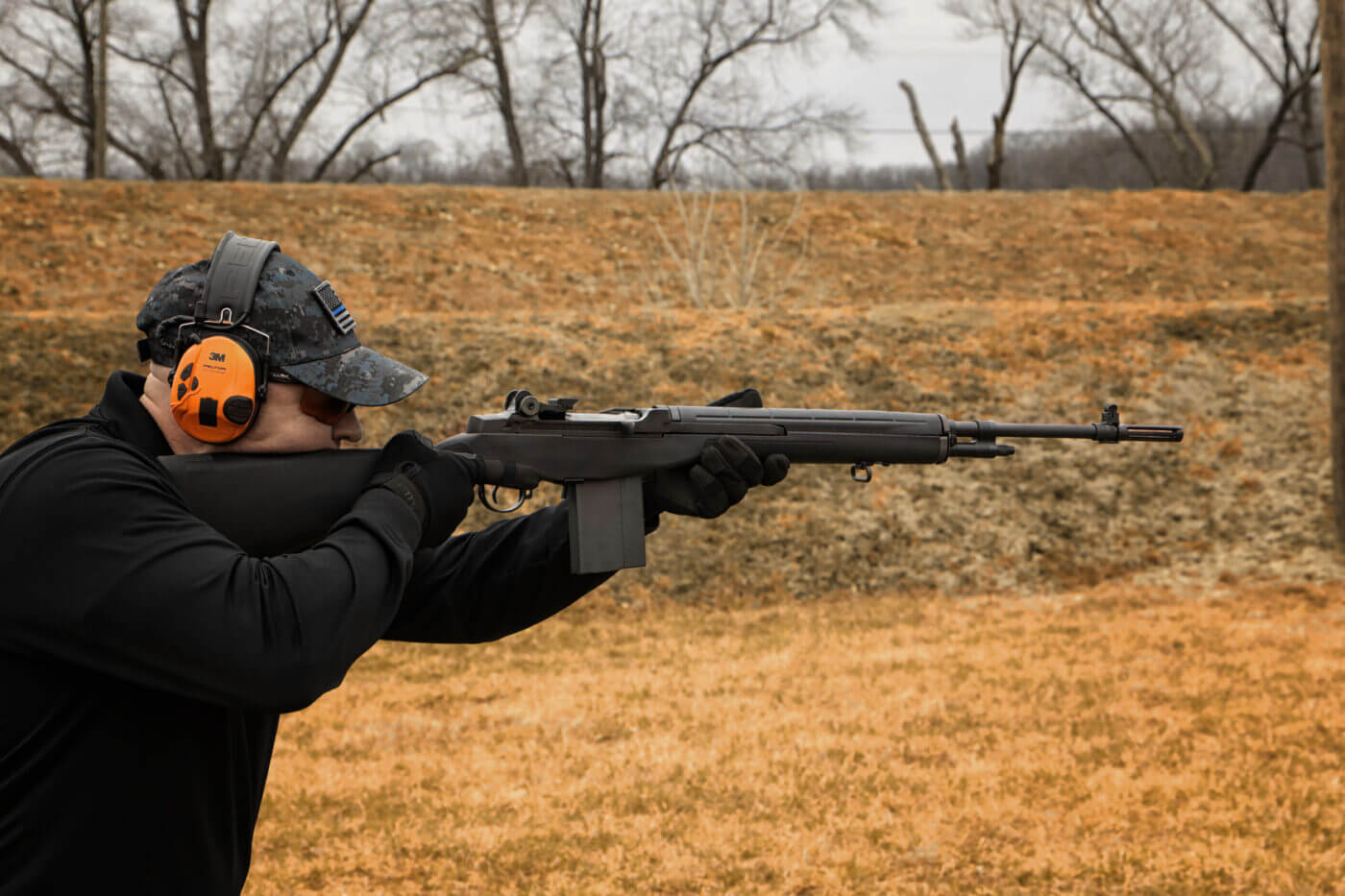 Springfield Armory M1A Loaded shot by a man in the field