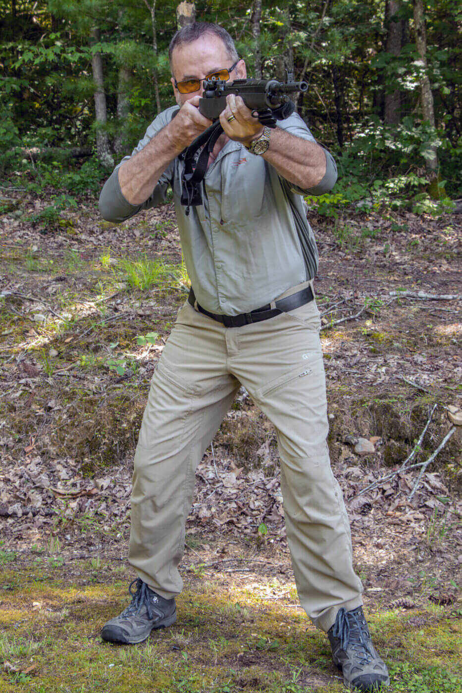 Demonstrating the proper standing rifle shooting position