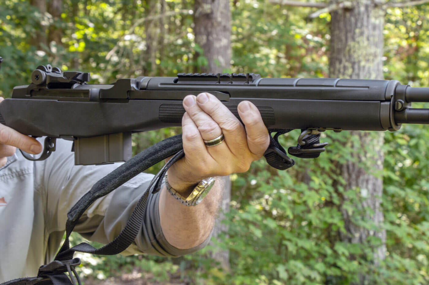 Man demonstrating how to hold a rifle