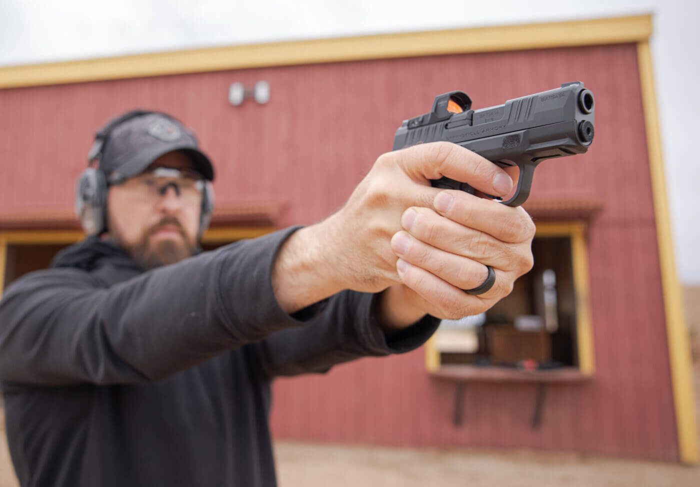 Man training with a Springfield Hellcat handgun