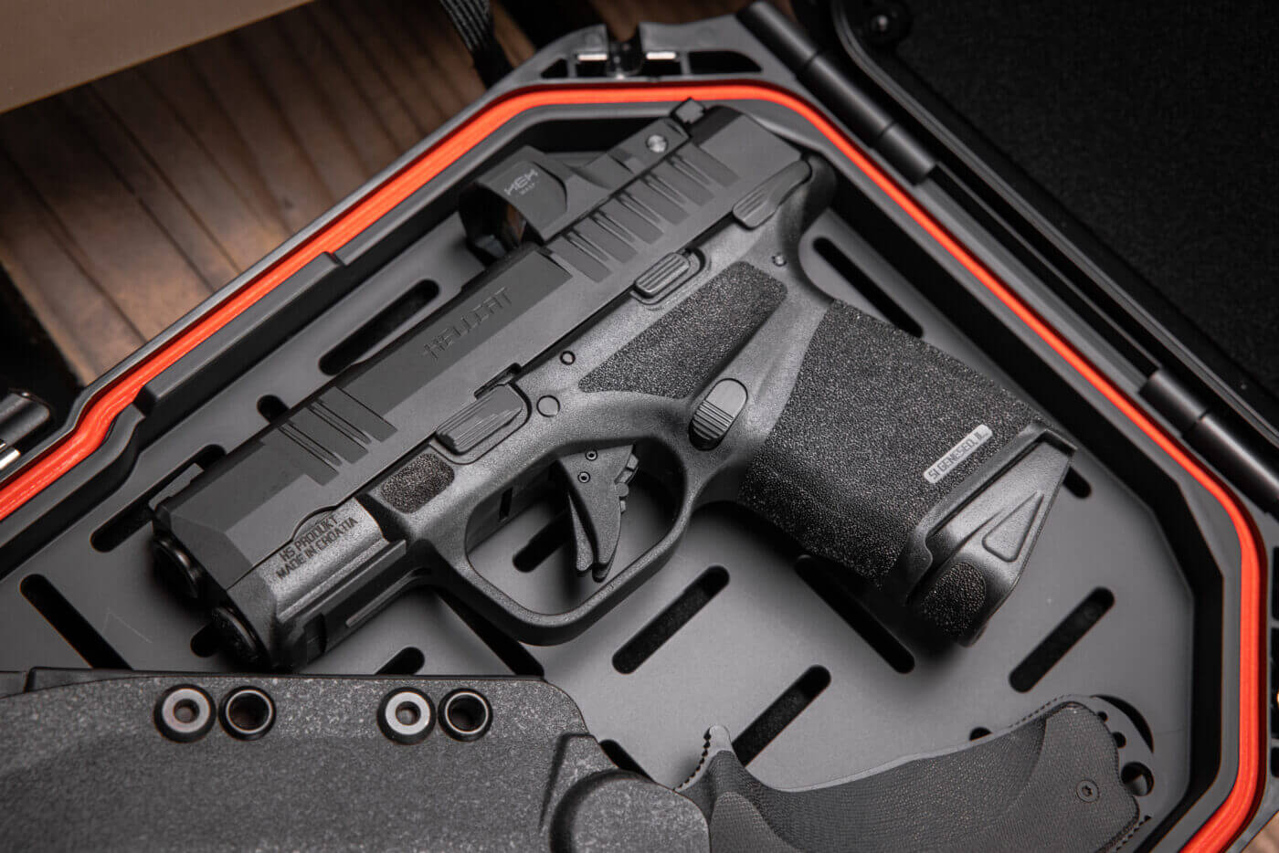 Springfield Hellcat pistol inside of a lockbox