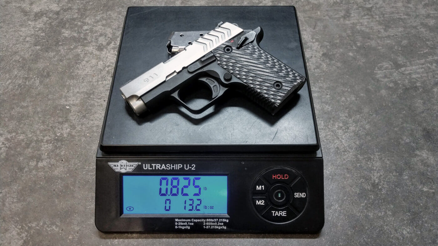 Springfield 911 pistol on scale