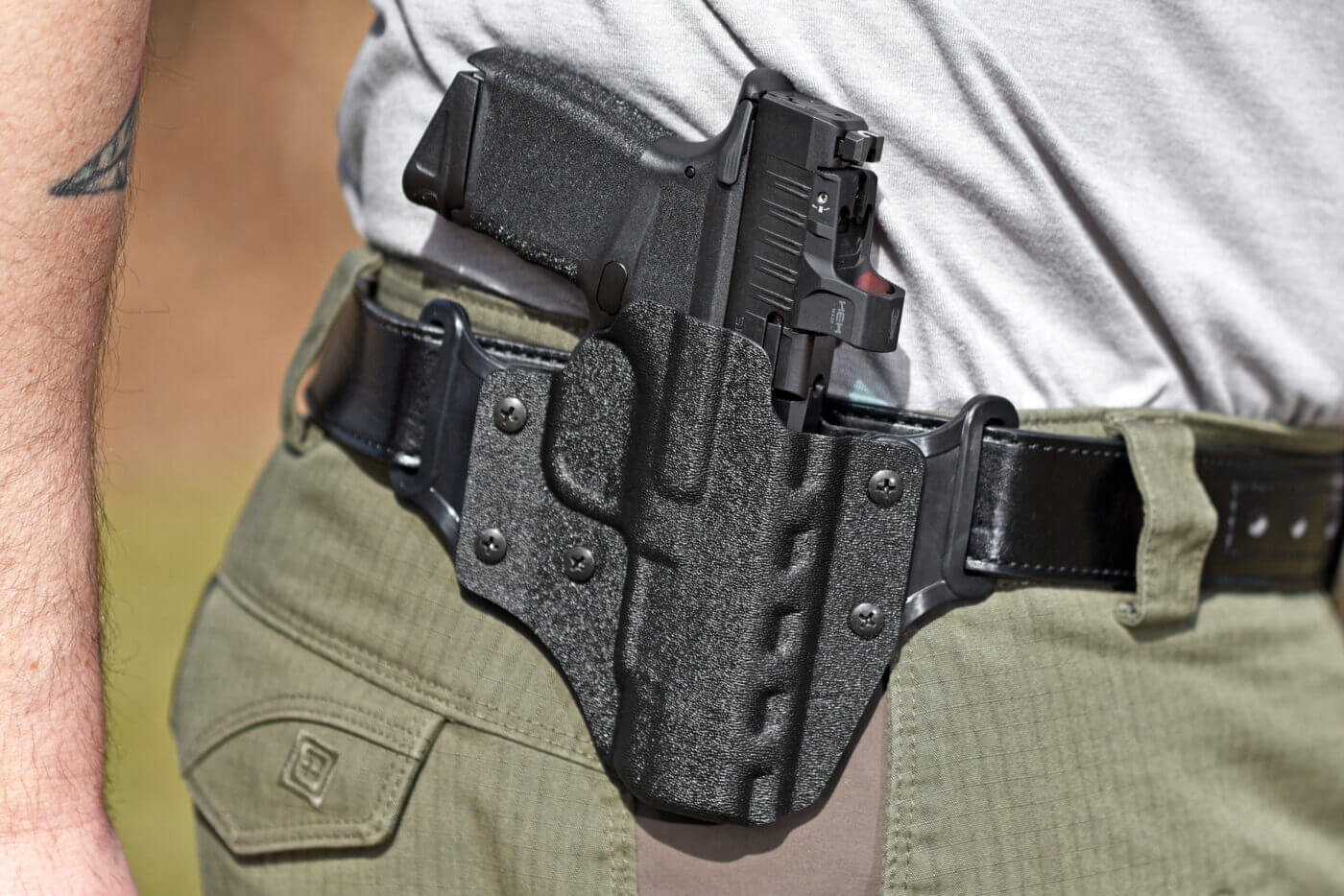 Man wearing DeSantis Veiled Partner holster with pistol