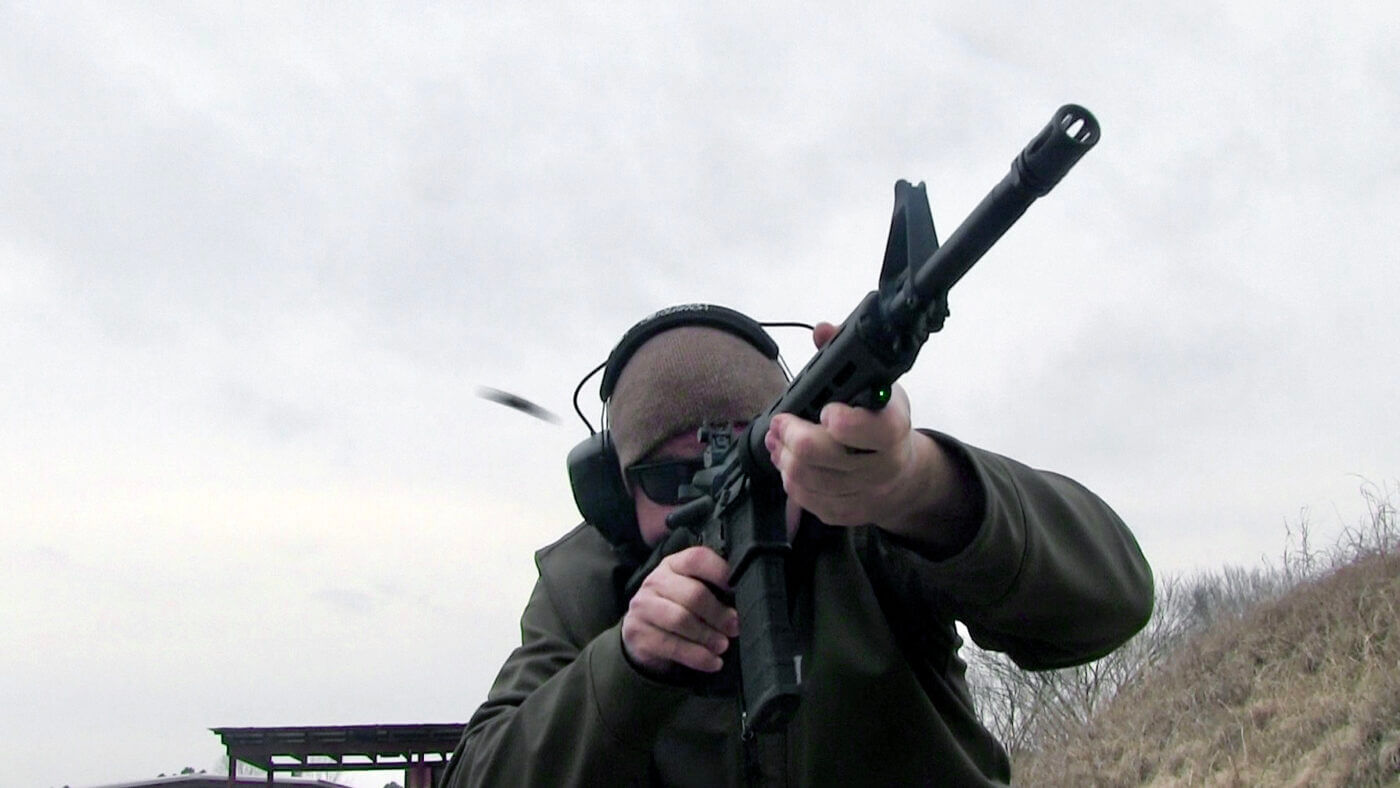 Man shooting a SAINT rifle