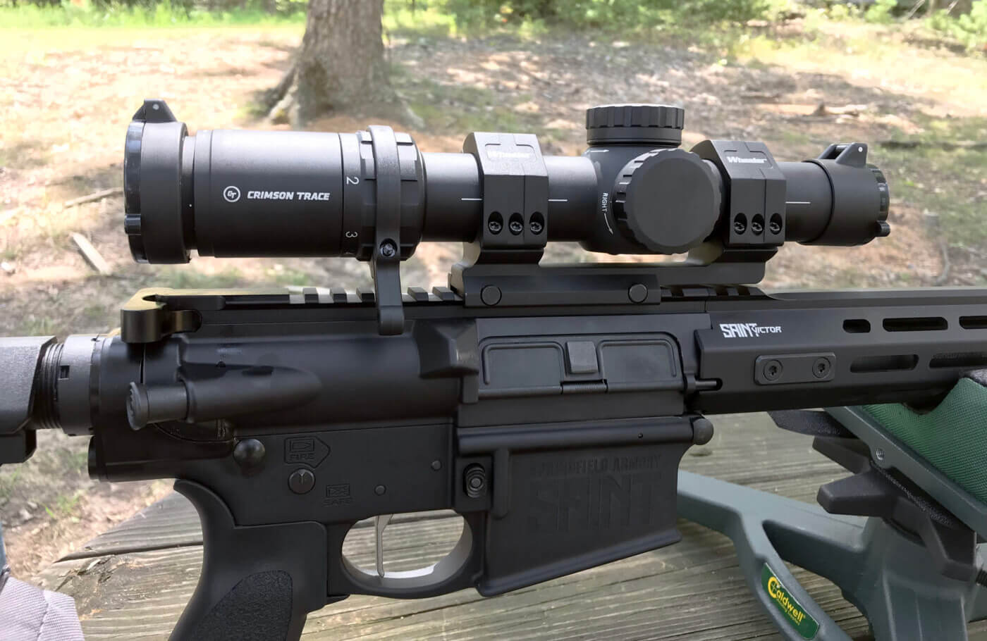 Crimson Trace scope mounted on a SAINT Victor rifle