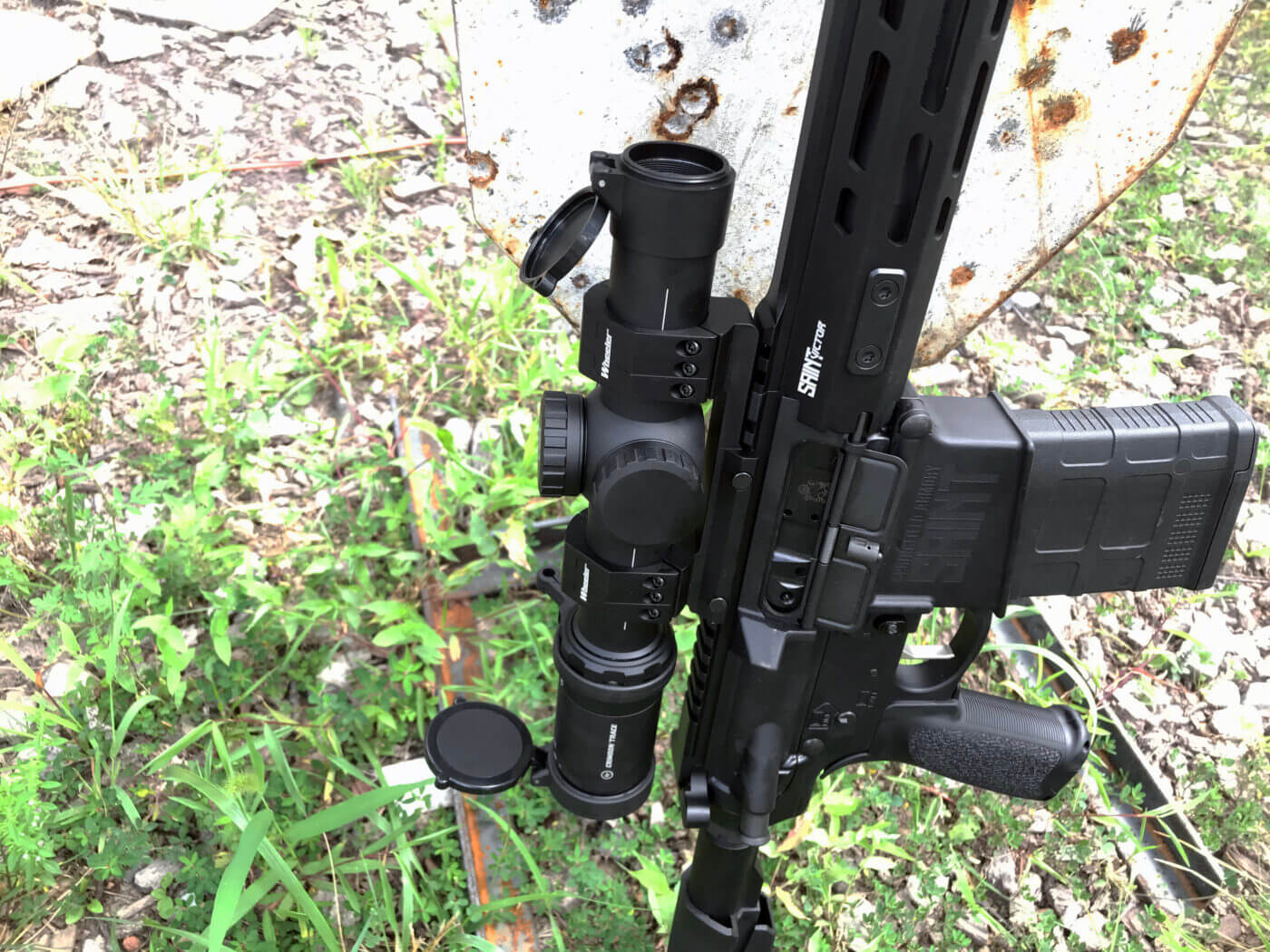 Rifle scope mounted on AR rifle