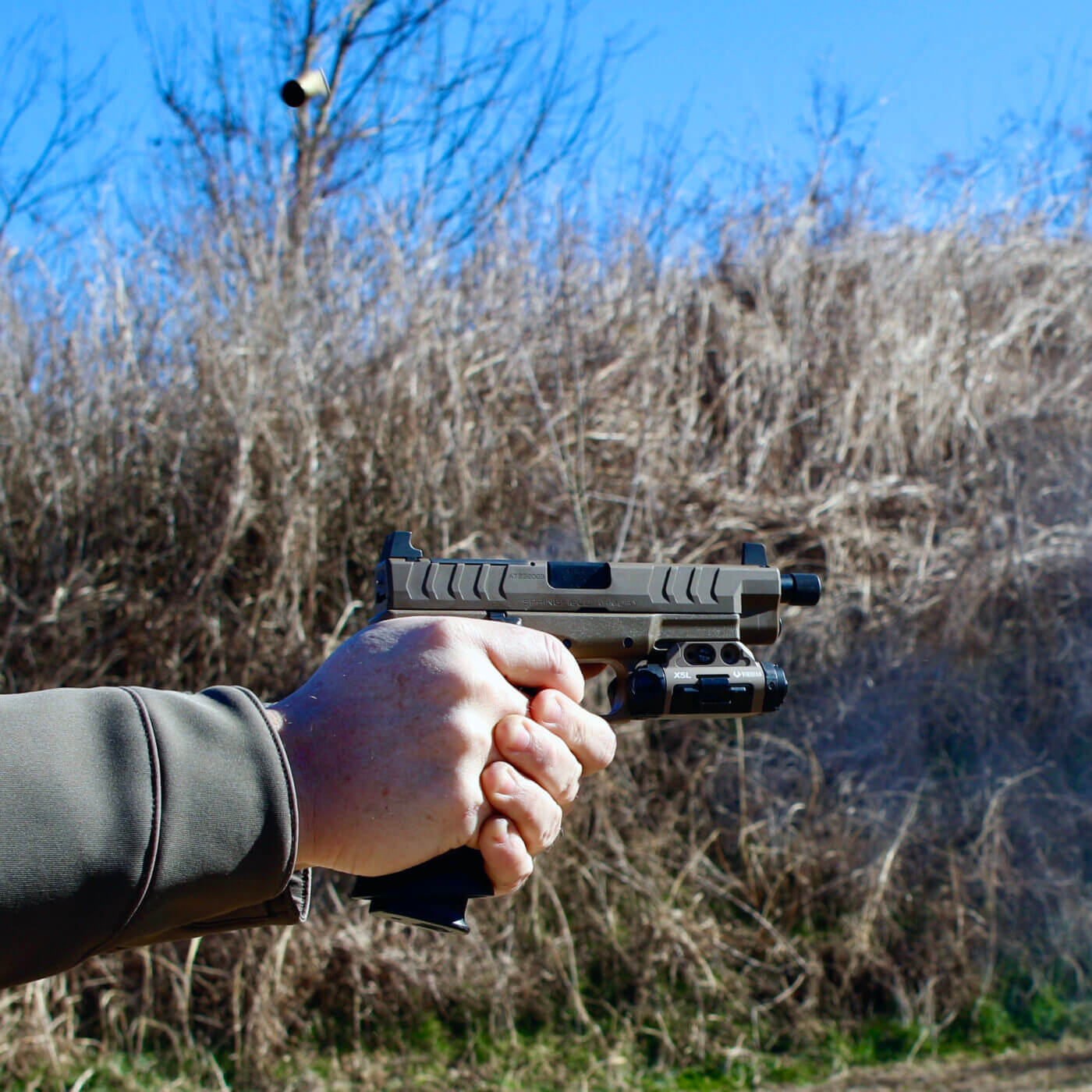 Shooting XD-M Elite pistol with minimal recoil