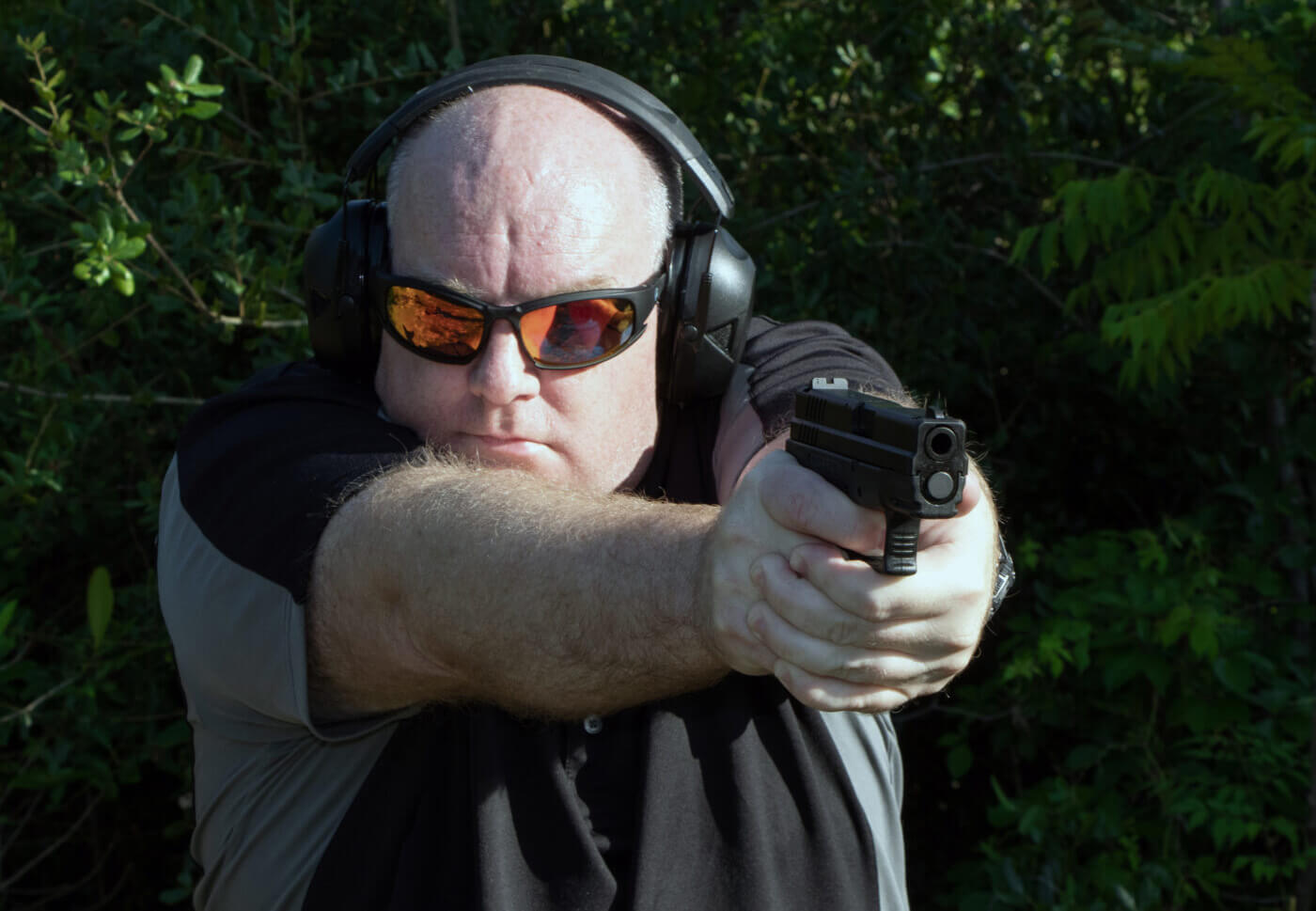 Man shooting the Springfield XD Sub-Compact