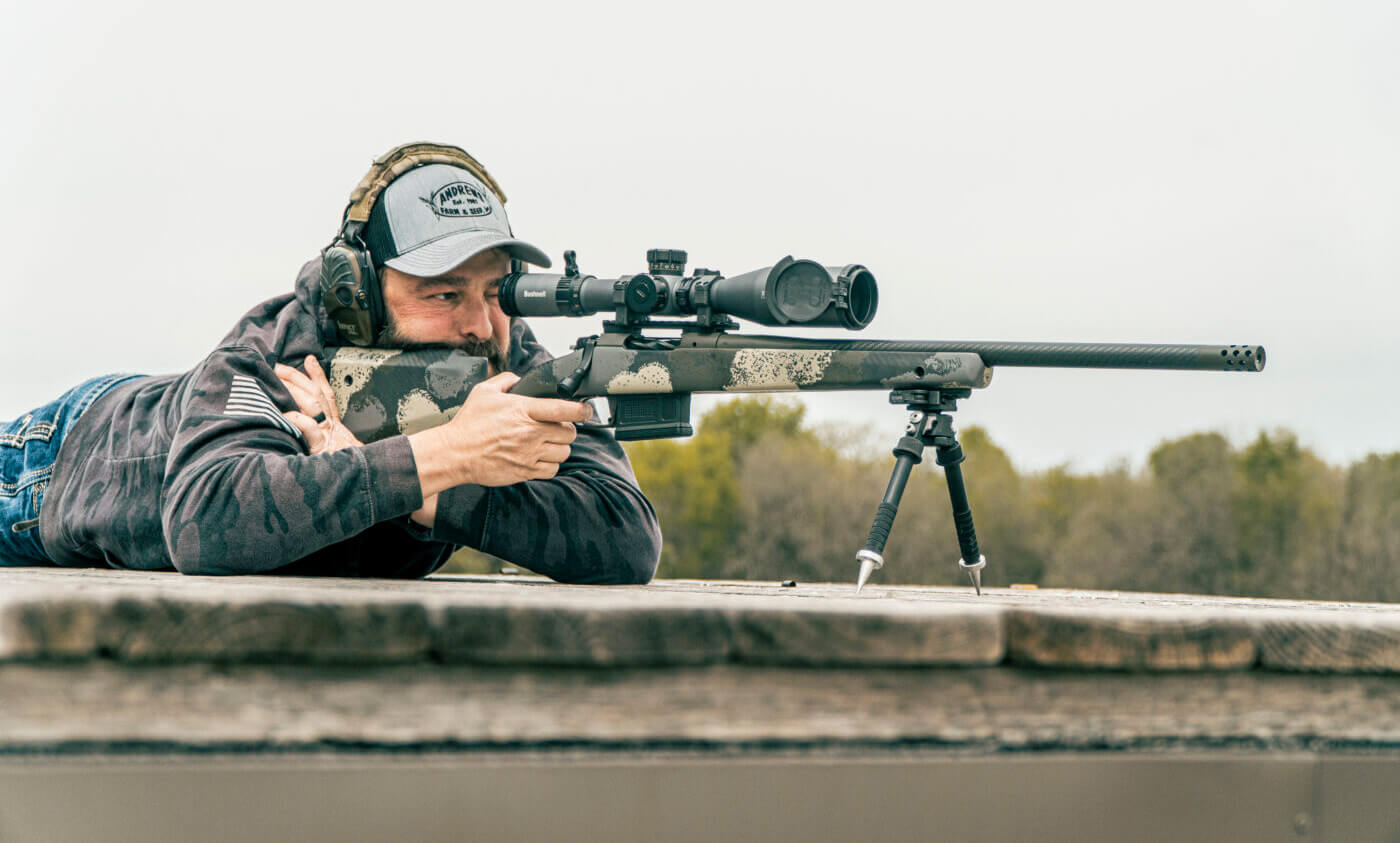 Man shooting a rifle on a bipod